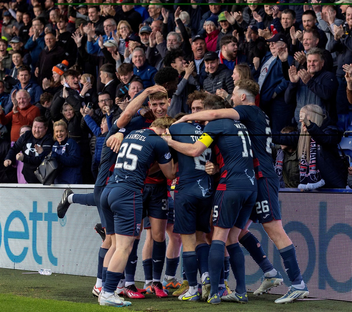 Jack Baldwin was mobbed by teammates after scoring in the 90th minute against St Johnstone. Picture: Ken Macpherson